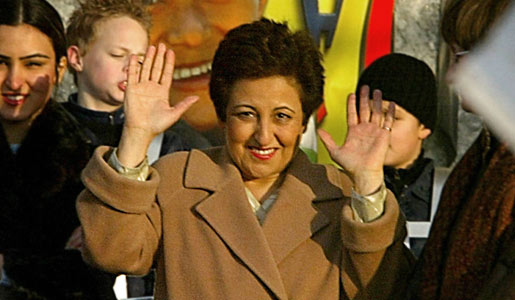 Shirin Ebadi, Nobel Peace Prize Laureate 2003, waves to some 4,000 flag-waving children